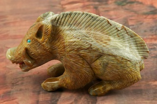 Zuni Wild Boar Fetish created by Zuni Artist Randy Lucio. Signed by the artist. Carved from Picasso Marble with Genuine Turquoise Eyes.